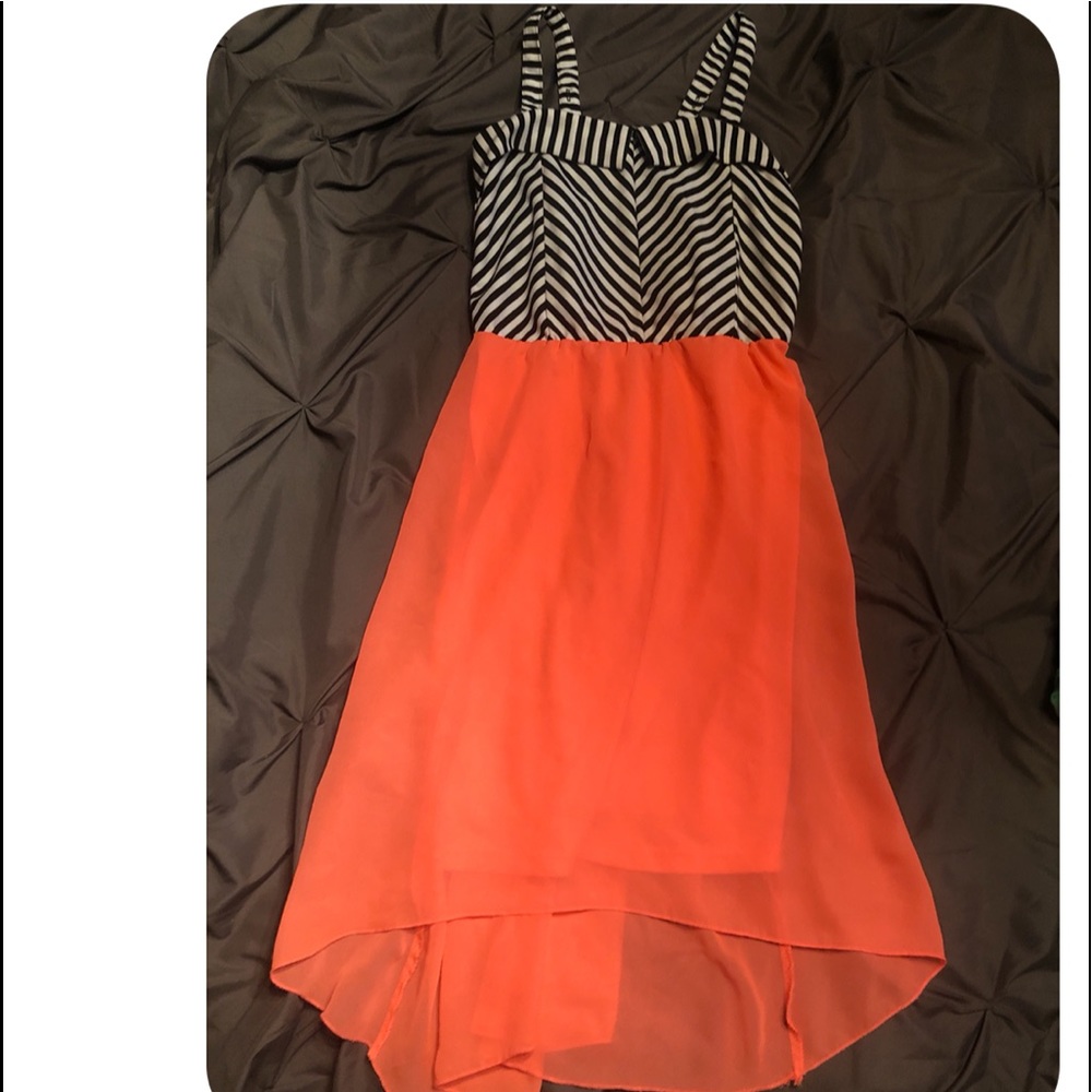 Black and white top with orange bottom dress